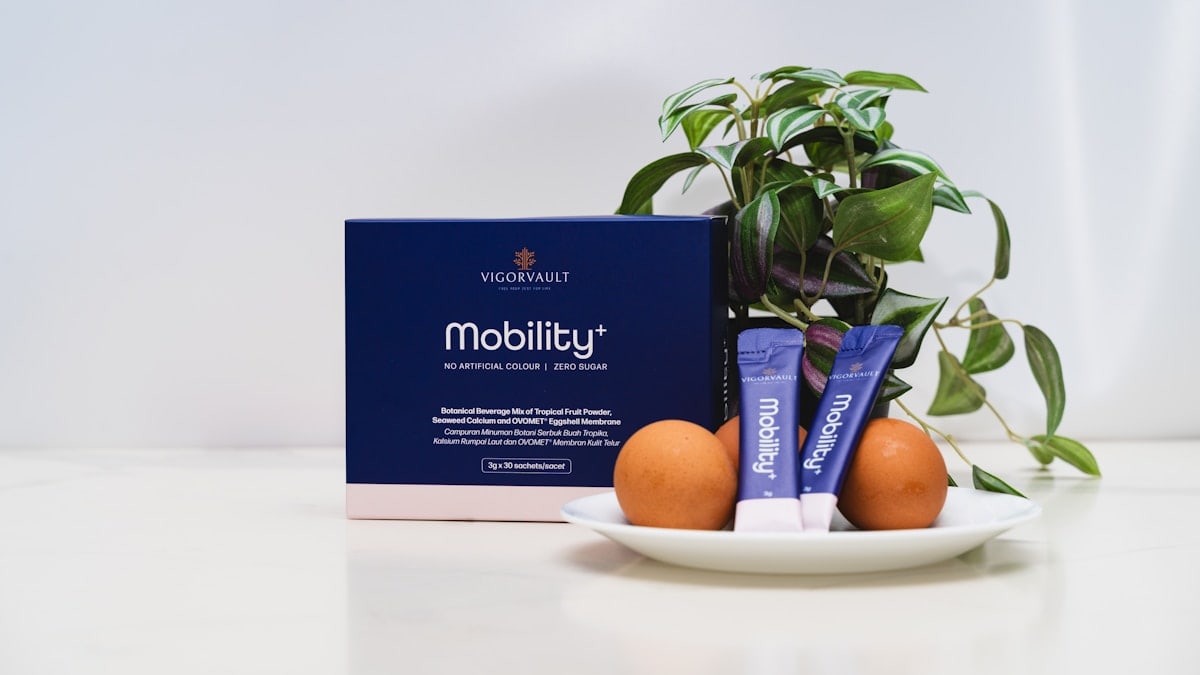 Mobility supplement box with eggs and plant.